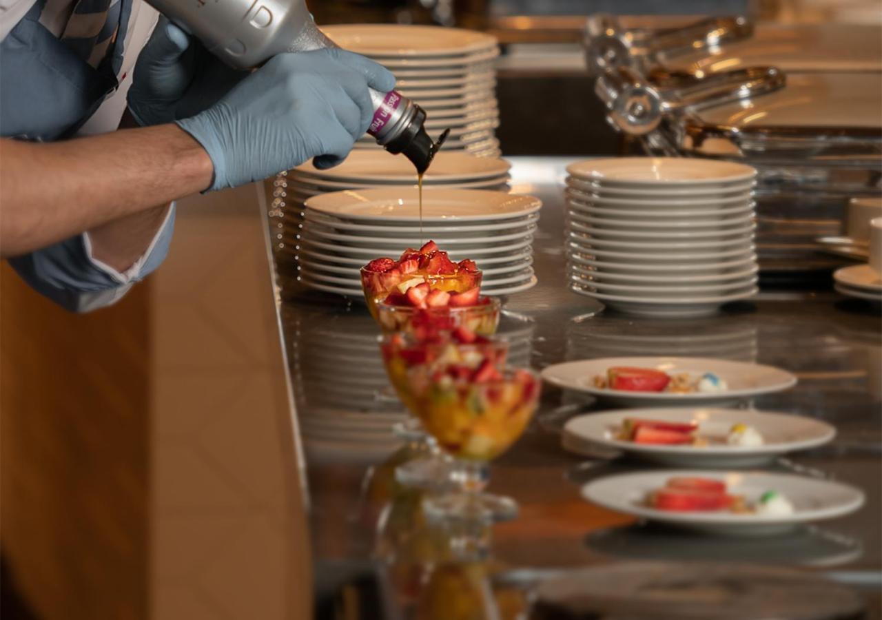 Crystal Inn Hotel - Alamein (Adults Only) El Alamein Luaran gambar A pastry chef finishing a dessert